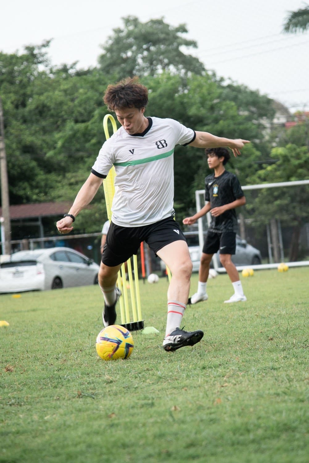 Striking through the ball