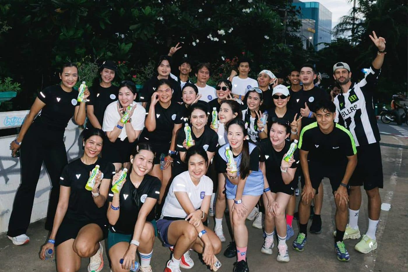 The whole group together on the street after the city run